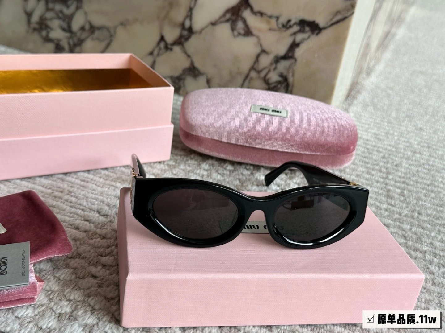 Miu Miu Cat Eye Sunglasses