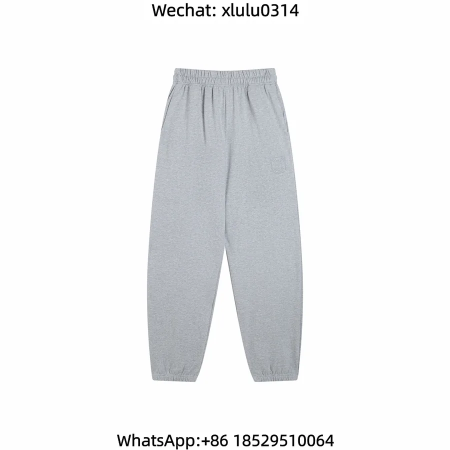 Vetements Cross Embroidered Cuffed Trousers