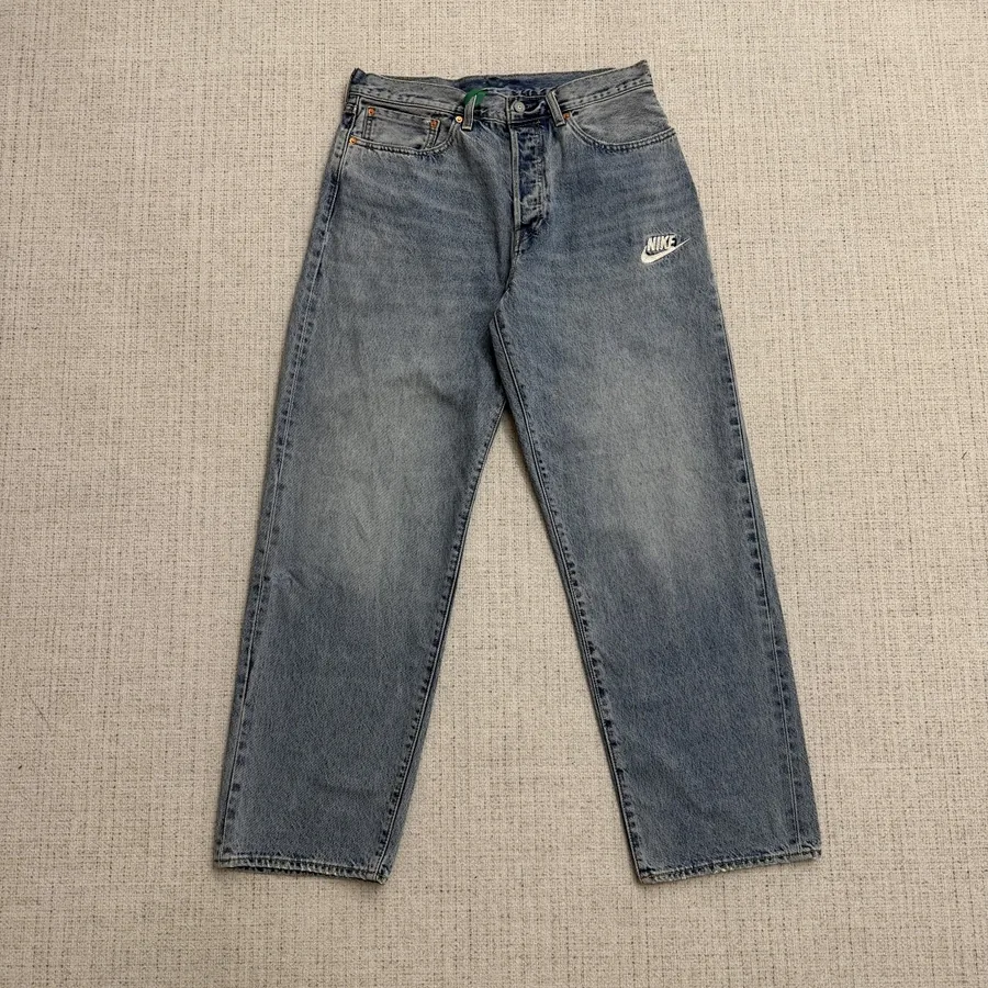 Nike Swoosh Washed Denim Jeans